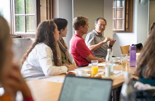 Participants discussing at tables