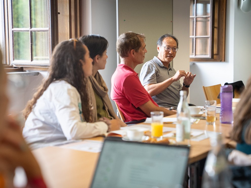 Participants discussing at tables
