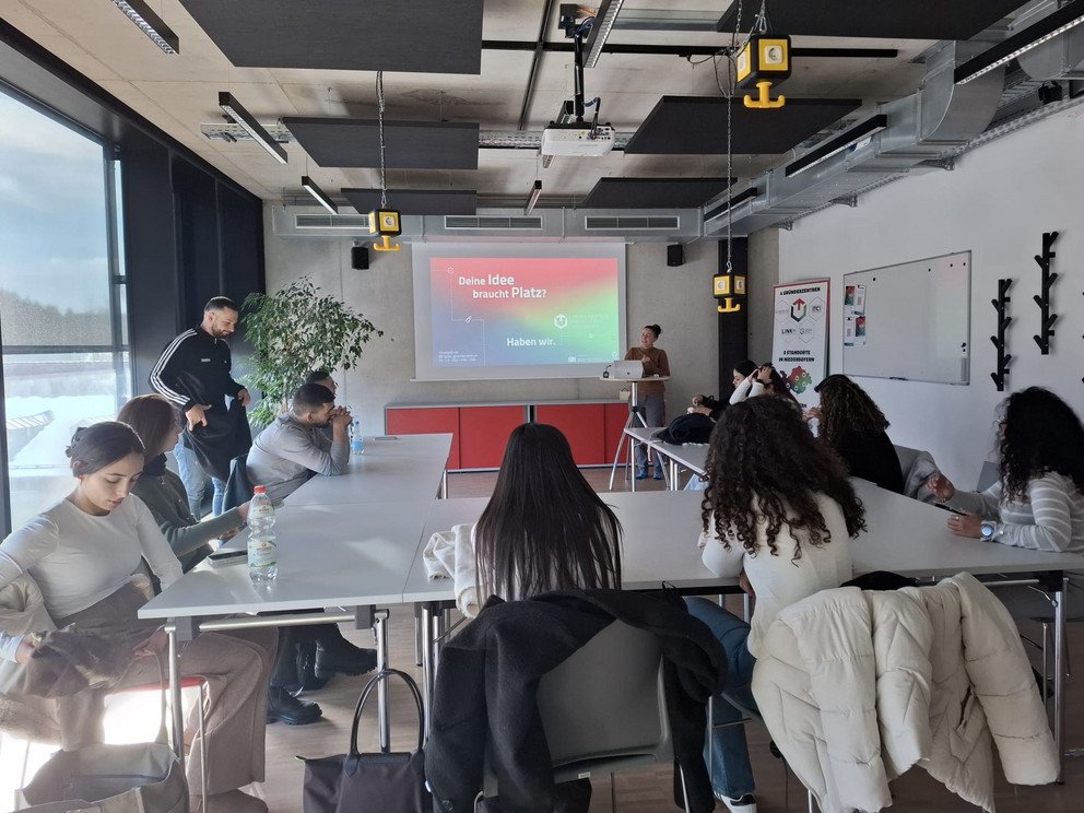 Students in the InnKubator listen to a presentation
