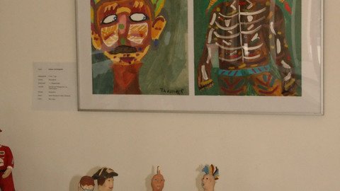 Zwei Bilder gerahmt abstrakte Gesichter