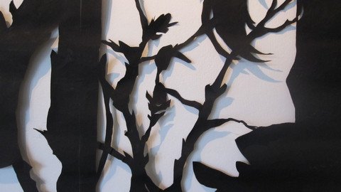 Pflanzenzweige ausgeschnitten aus schwarzer Pappe