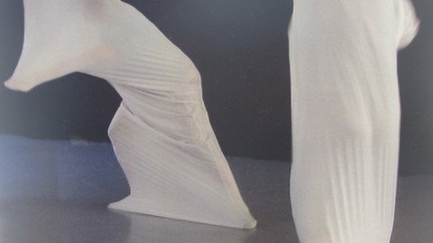 Foto Menschen unter Stoff